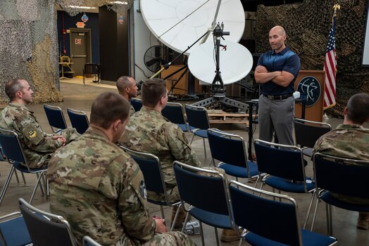  Guardians attend a Continuous Fitness Assessment, or CFA, study informational session hosted by an Air Force Research Laboratory team at a facility near Wright-Patterson Air Force Base, Ohio, June 8, 2023. The CFA study is a two-year voluntary effort with Guardians to assess the use of wearable fitness devices that measure physical activity. Guardians who pre-enrolled in the study received watches along with guidance on participation requirements. The CFA is part of the U.S. Space Force’s Holistic Health Approach, an initiative that promotes wellness through positive behaviors and seeks to replace traditional military fitness tests with data from continuous monitoring technology. (U.S. Space Force photo / Rick Eldridge).