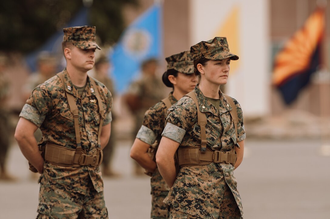 U.S. Marines assigned to the 15th Marine Expeditionary Unit stand in formation during the 15th MEU composite ceremony at Marine Corps Base Camp Pendleton, California, June 14, 2023. The ceremony served the official start of the MEU’s training cycle, during which the 15th MEU command element gained the subordinate elements of Battalion Landing Team 1/5, Combat Logistics Battalion 15, and Marine Medium Tiltrotor Squadron (VMM) 165, forming a Marine Air-Ground Task Force. (U.S. Marine Corps photo by Sgt. Sydney Smith)