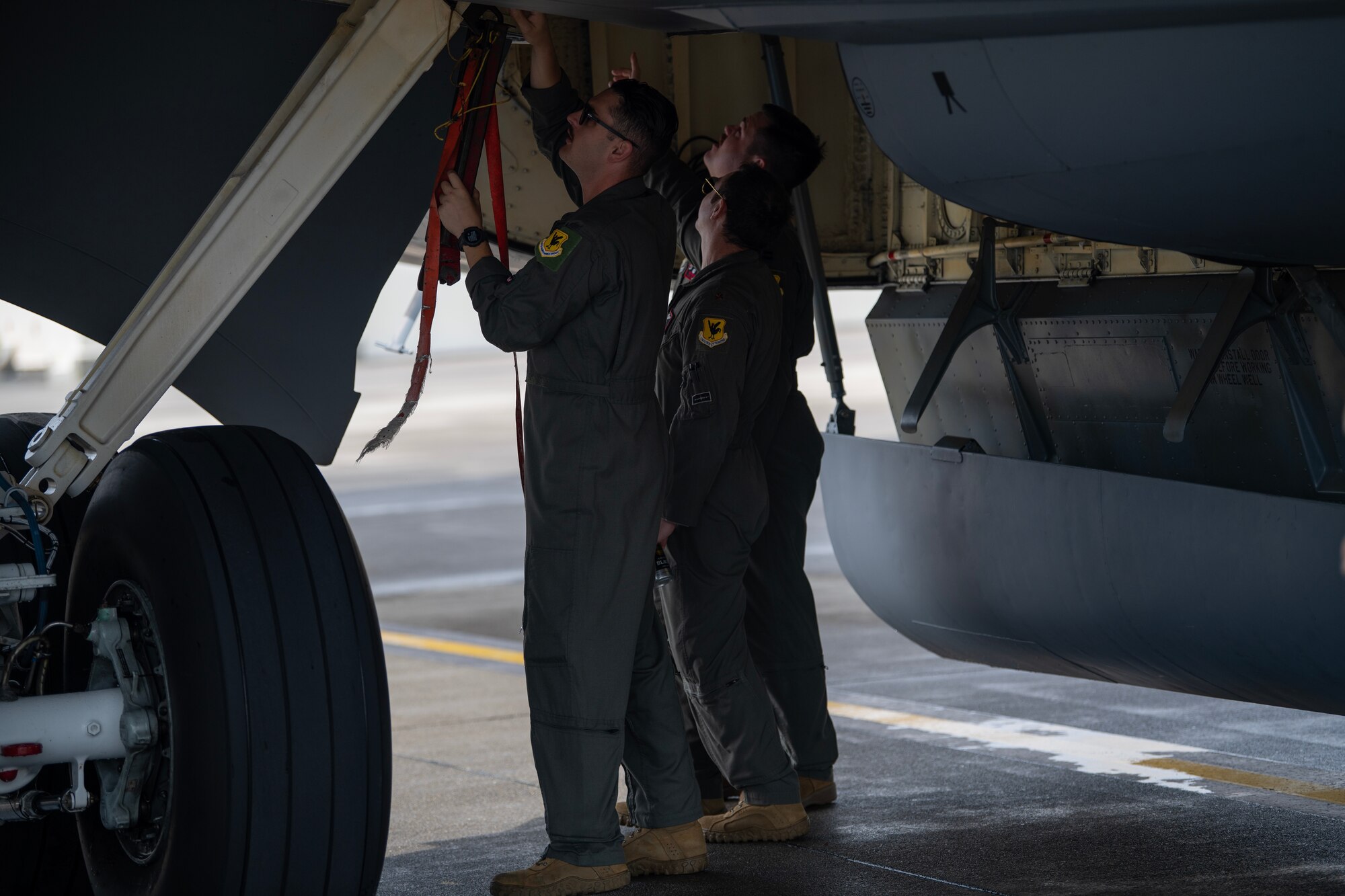 909th ARS Members conducting pre-flight checks