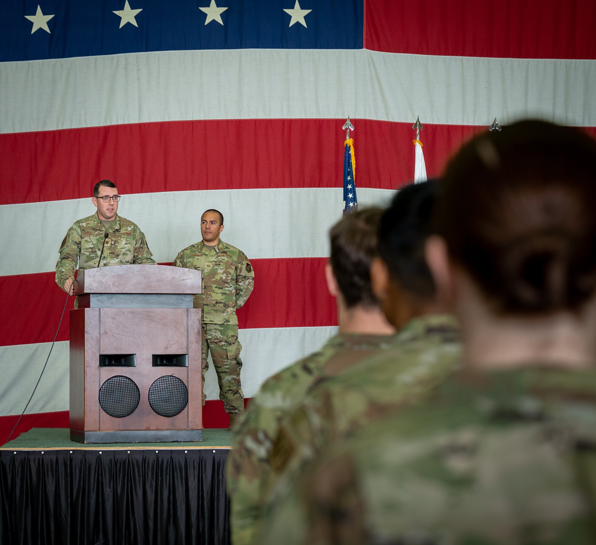 Photo of airmen and various leadership at a change of command ceremony