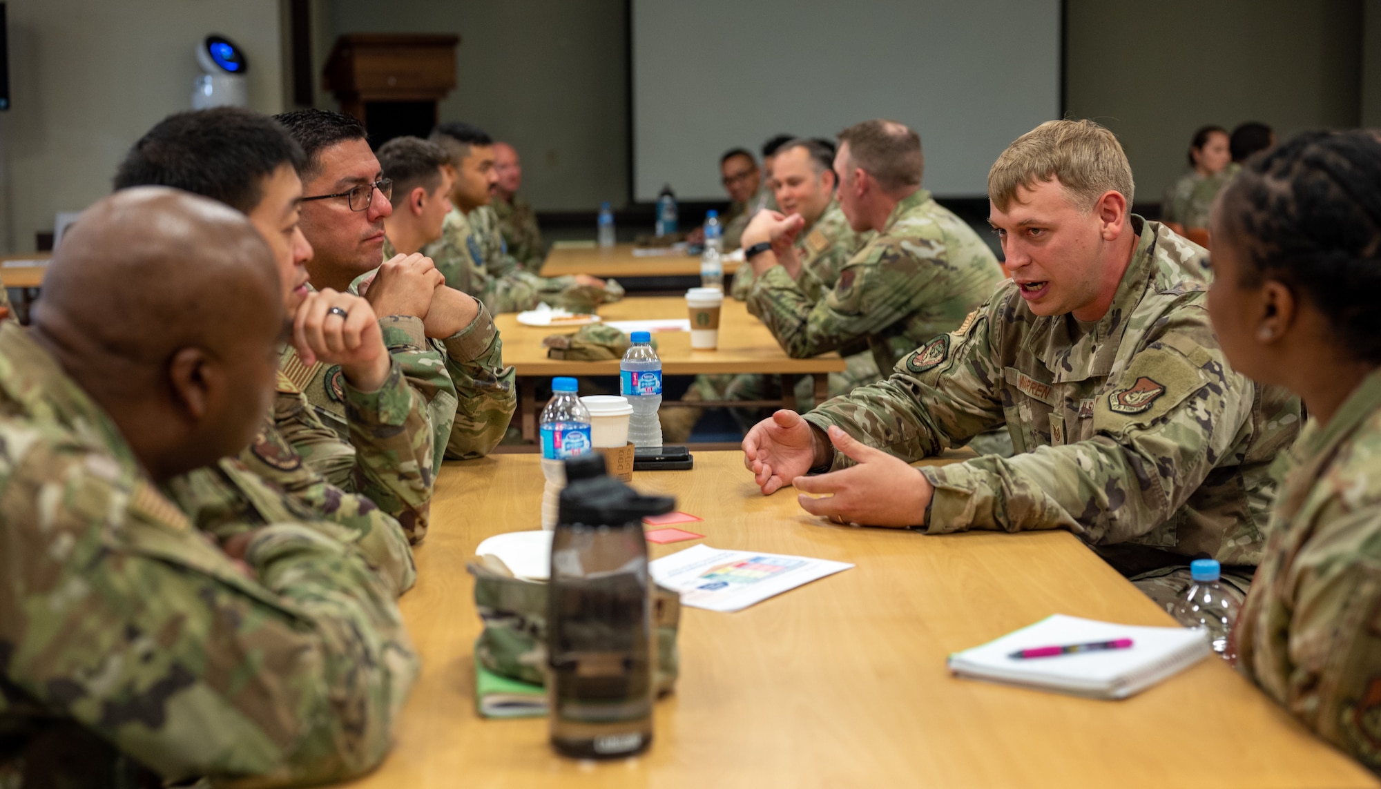 Photo of Airmen at a mentor-mentee group setting