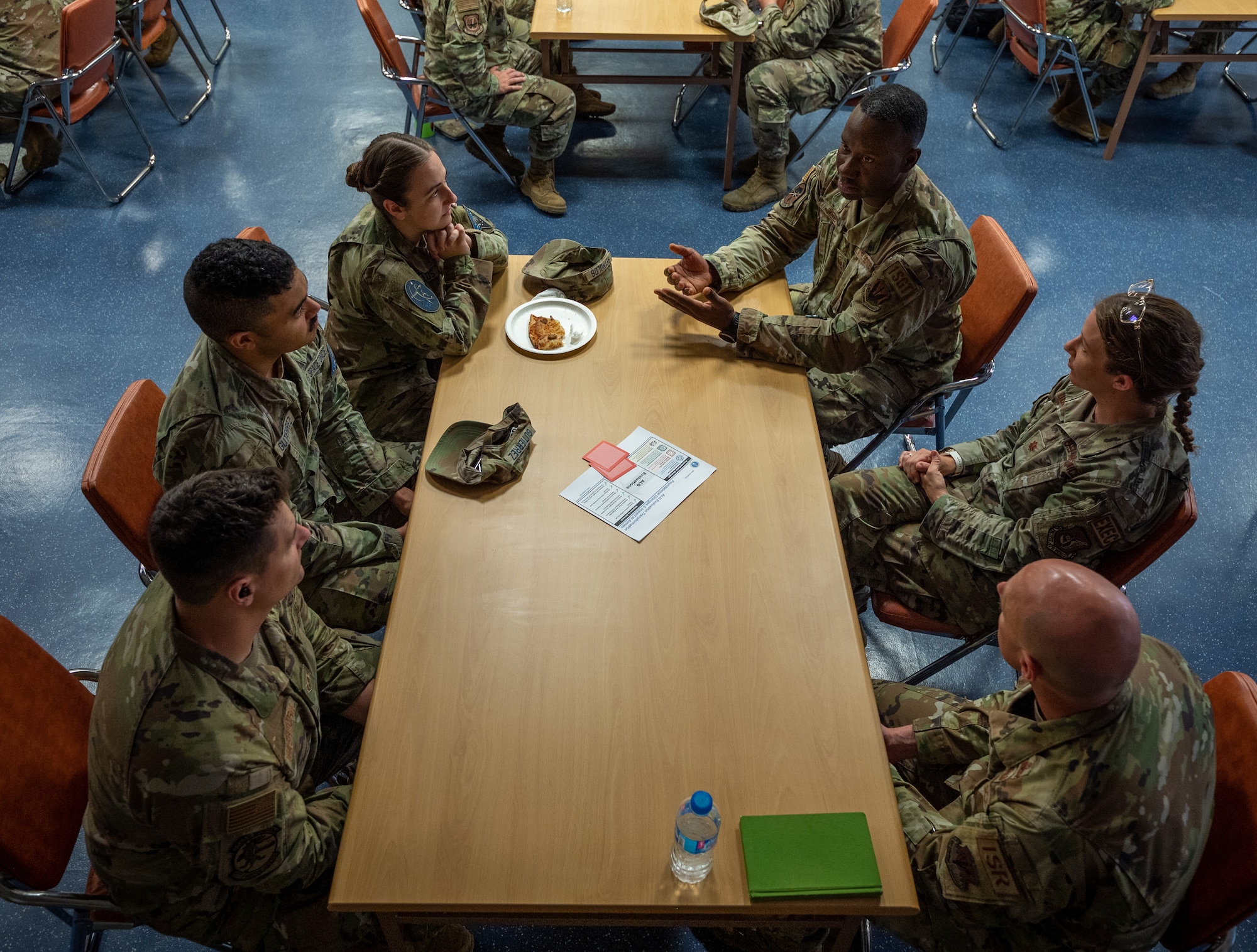 Photo of Airmen at a mentor-mentee group setting