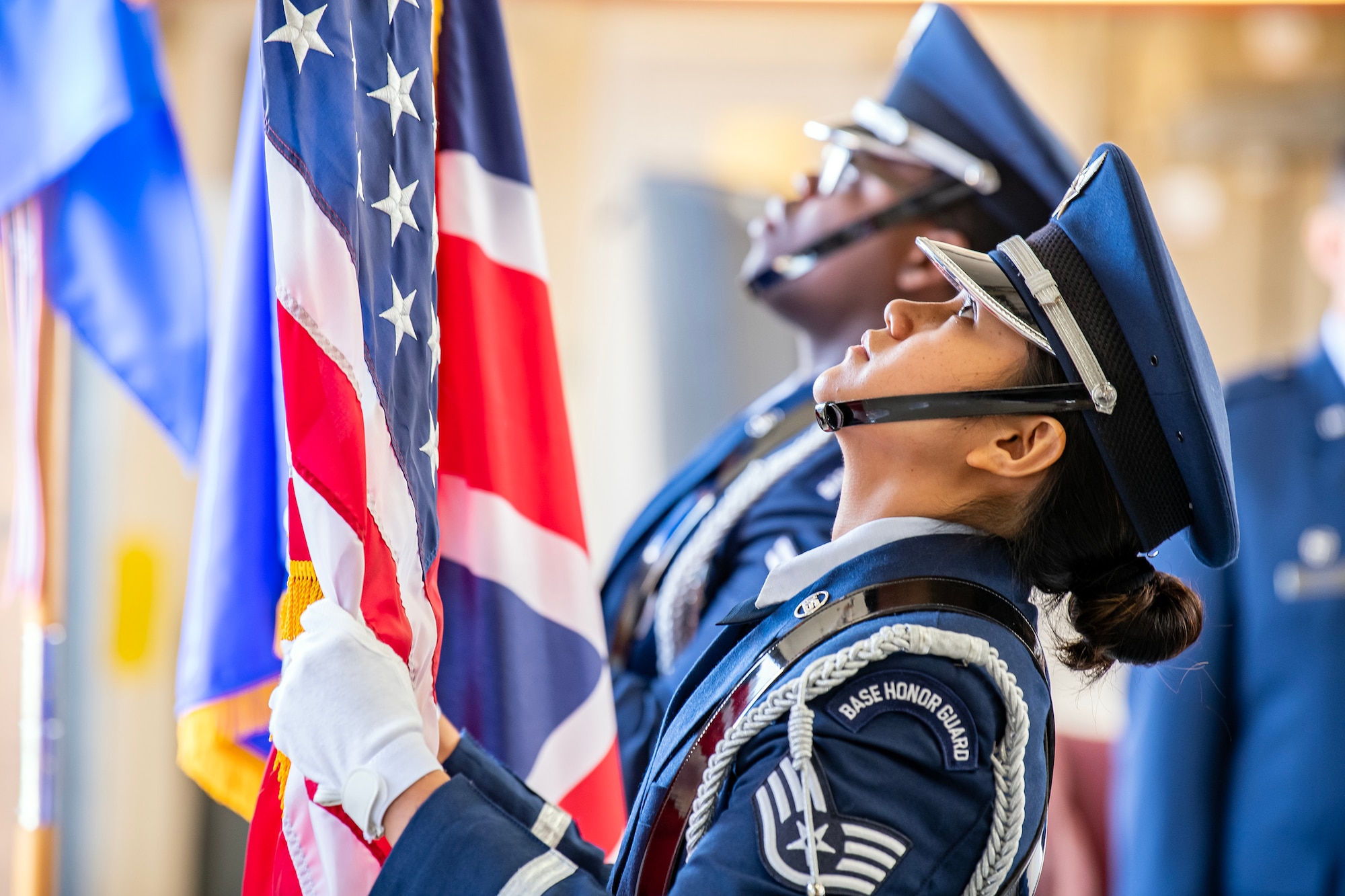 Airmen from the 423d Air Base Group Honor Guard post the colors during a change of command ceremony at RAF Croughton, England, June 15, 2023. The 423d ABG HG supported the ceremony by posting the colors and rendering honors during the ceremony. (U.S. Air Force photo by Staff Sgt. Eugene Oliver)
