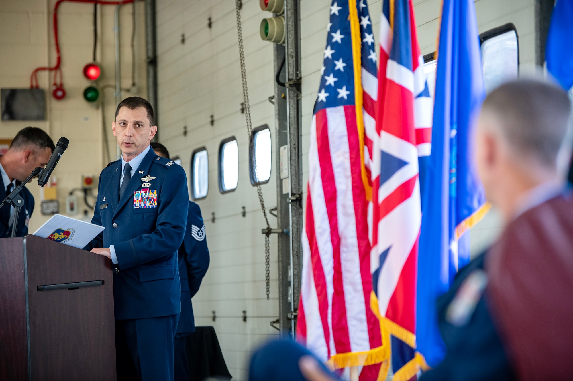 U.S. Air Force Col. Edward Spinelli, 422d Air Base Group commander, speaks during a change of command ceremony at RAF Croughton, England, June 15, 2023.  Lt. Col. Jethro Sadorra relinquished command of the 422d Civil Engineer Squadron to Maj. Kirk Hull. (U.S. Air Force photo by Staff Sgt. Eugene Oliver)