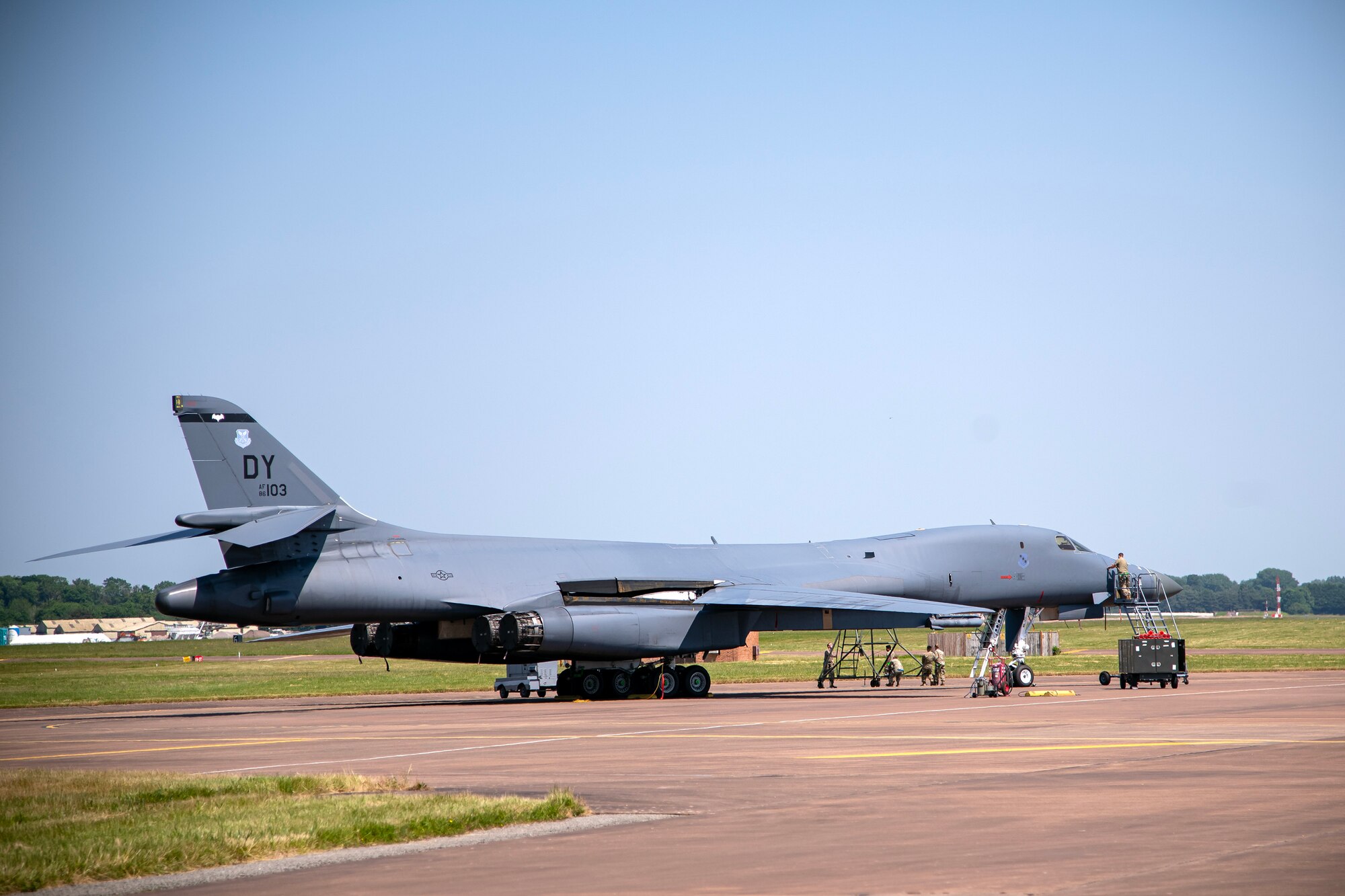 Airmen from the 9th Expeditionary Bomb Squadron maintain a B-1B Lancer assigned to the 9th EBS at RAF Fairford, England, June 14, 2023. Strategic bomber missions enhance the readiness necessary to respond to any potential crisis or challenge across the globe. Support operations executed by multiple units are key in ensuring the U.S. Air Force is postured and ready with a credible force to assure, deter, and defend in an increasingly complex security environment. 
(U.S. Air Force photo by Staff Sgt. Eugene Oliver)