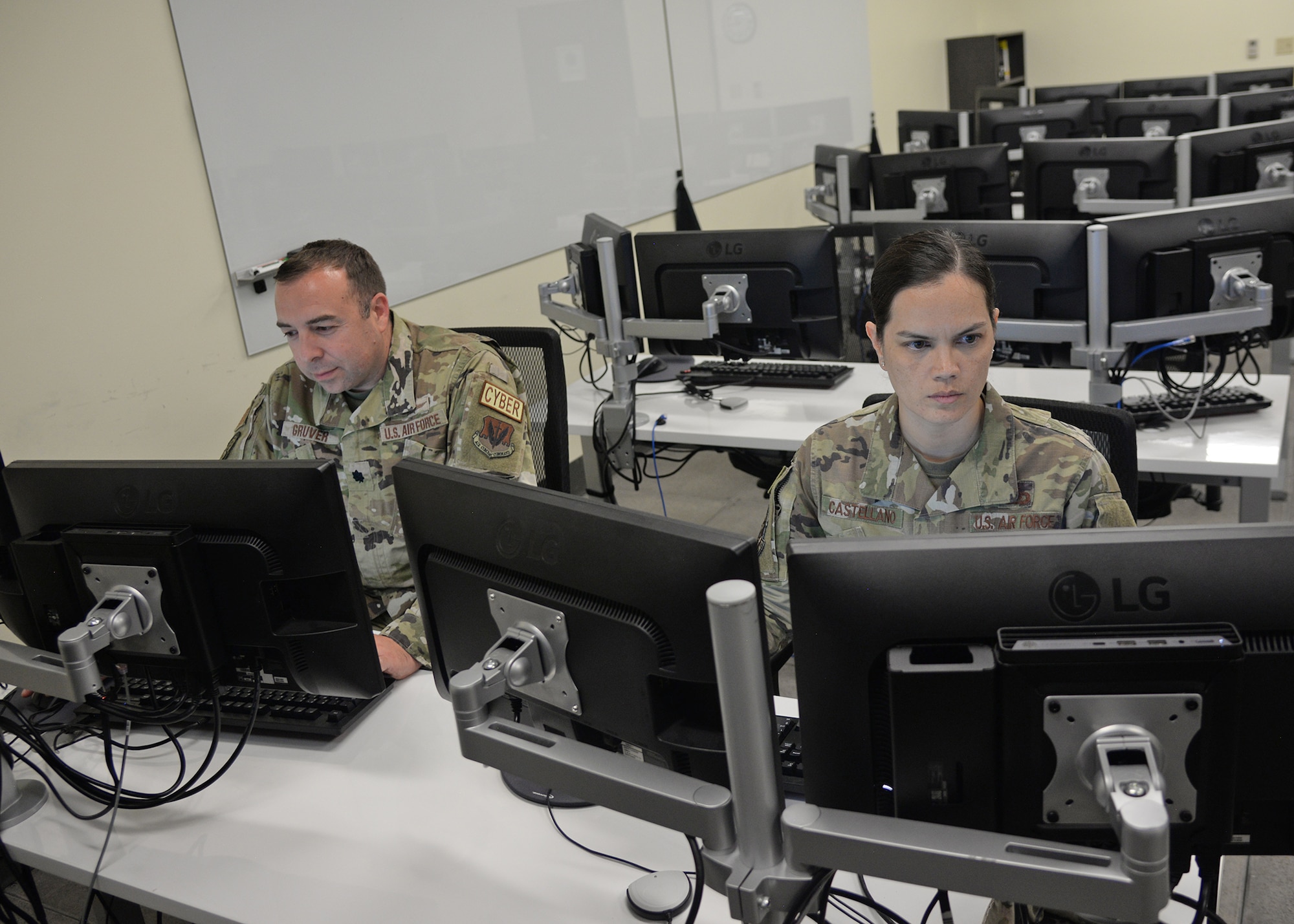 Airmen assigned to the 175th Cyberspace Operations Group work at computer terminals at Martin State Air National Guard Base, Middle River, Maryland on June 20, 2023.