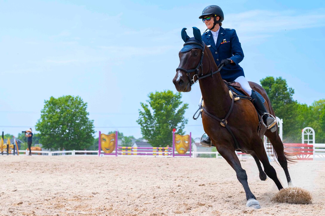 An airman rides a horse.