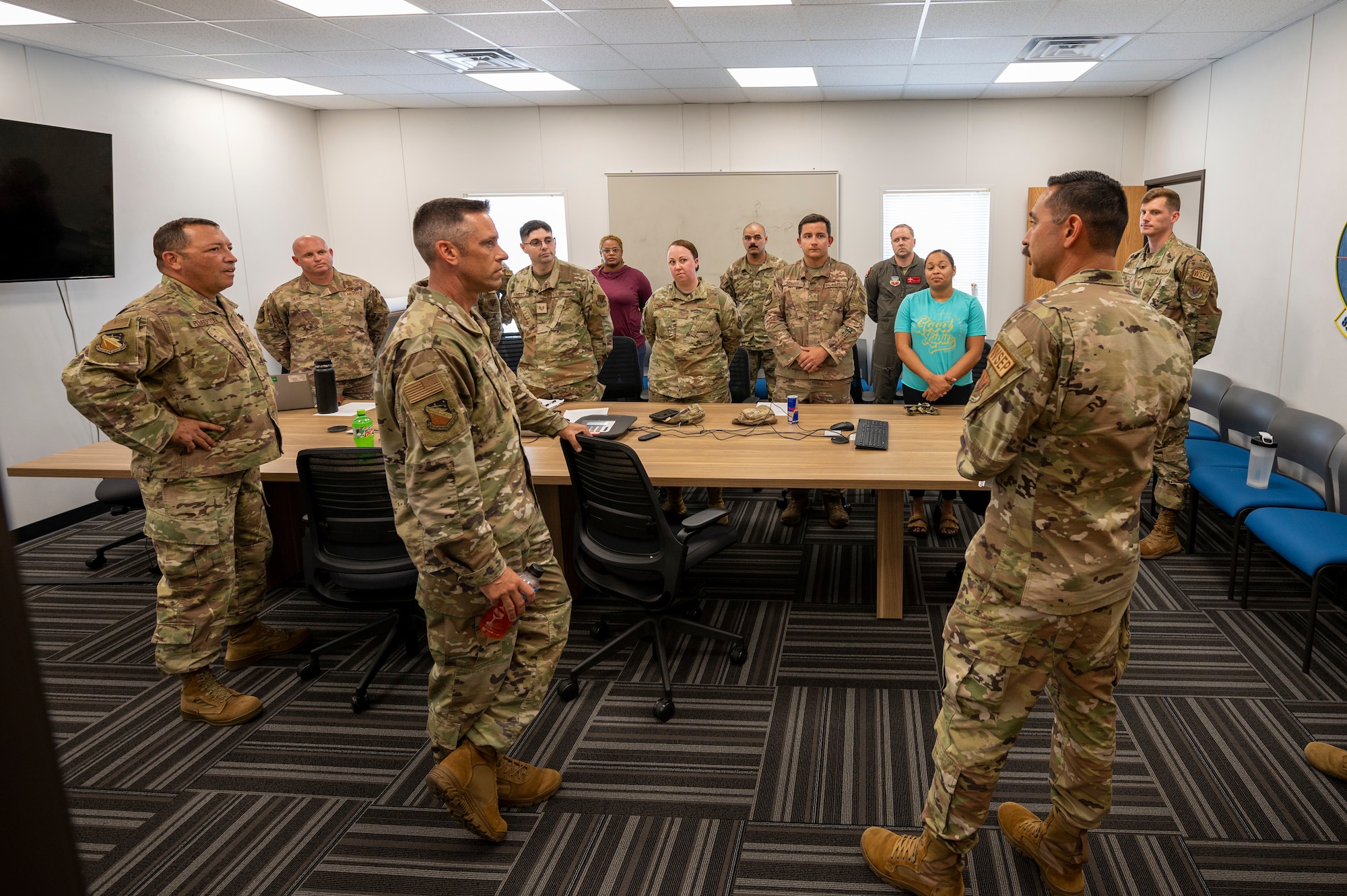 Airmen sit in a classroom