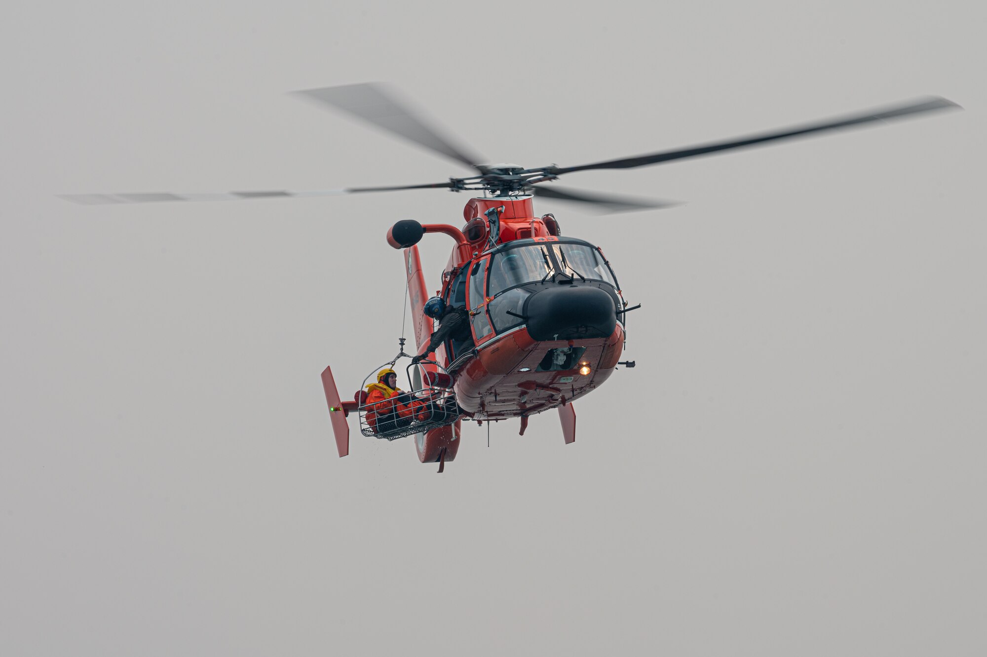 Royal Australian Air Force, Canadian Air Force, and U.S. Air Force aviators participate in a Survival, Evasion, Resistance and Escape water survival training course at Barnegat Light, N.J., June 6, 2023. SERE personnel from Joint Base McGuire-Dix-Lakehurst partnered with Coast Guard Air Station Atlantic City, N.J., to provide aircrew with realistic scenarios where flight crews must work together in order to survive a potential aircraft crash in the ocean. Exercises like these help build interoperability and standardized training capabilities throughout different service branches and our allied partners.