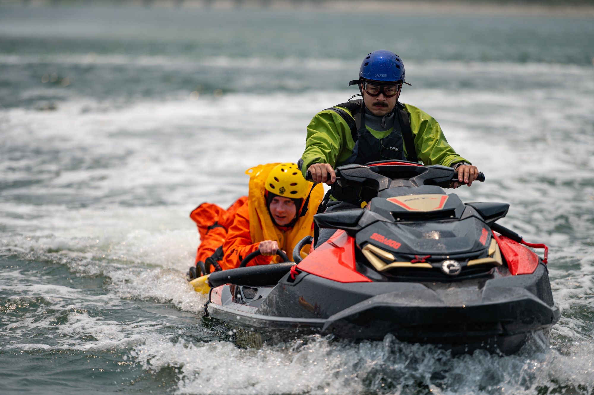 Royal Australian Air Force, Canadian Air Force, and U.S. Air Force aviators participate in a Survival, Evasion, Resistance and Escape water survival training course at Barnegat Light, N.J., June 6, 2023. SERE personnel from Joint Base McGuire-Dix-Lakehurst partnered with Coast Guard Air Station Atlantic City, N.J., to provide aircrew with realistic scenarios where flight crews must work together in order to survive a potential aircraft crash in the ocean. Exercises like these help build interoperability and standardized training capabilities throughout different service branches and our allied partners.