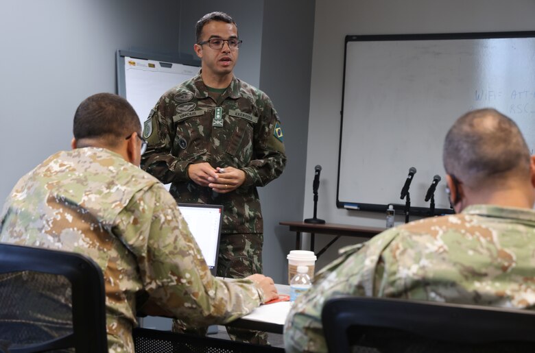 Major Carlos Viniclus Carneiro Santana, Brazilian Army, speaks at the Multi-Lateral Disaster Lessons Learned Workshop at the Readiness Support Center, Mobile, Alabama, June 13, 2023. Santana, along with other participants from Peru, Brazil, Chile, and U.S. Army South, shared lessons learned when they dealt with recent disasters in their countries. (U.S. Army photo by Chuck Walker)