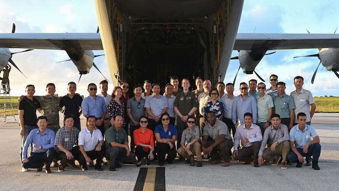 Airmen in front of an aircraft