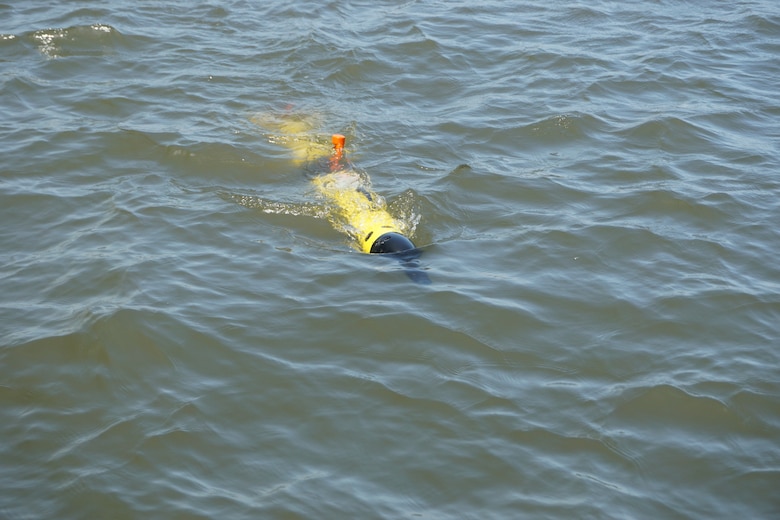 The i3XO EcoMapper, an autonomous underwater vehicle, at surface returning from an underwater survey in the Bayou Rigaud Navigation Channel near Grand Isle, Louisiana. Scientists from the U.S. Army Engineer Research and Development Center Environmental Laboratory recently assisted the U.S. Army Corps of Engineers New Orleans District to measure the turbidity near a dredging operation in the Bayou Rigaud Federal Navigation Channel.