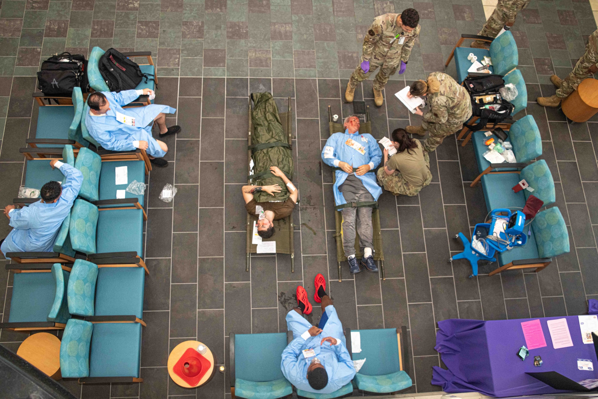 Clinical and Patient Administration team members track and coordinate movement to a high-level care facility for decontaminated patients who arrived at 42nd Medical Group. Exercises like these are critical components of medical readiness training and development, and they ensure servicemembers are prepared to conduct their assigned missions in garrison and downrange.