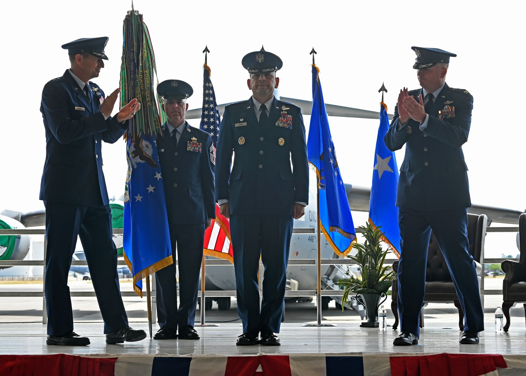 U.S. Air Force Col. Sergio Anaya, commander of the 62d Airlift Wing, assumes command of the 62d AW during a change of command ceremony at Joint Base Lewis-McChord, Washington, June 21, 2023. Anaya, former 62d Operations Group commander, assumed command of more than 2,400 active-duty military and civilian personnel, along with 40 permanently assigned C-17 Globemaster III aircraft that support worldwide combat and humanitarian airlift and airdrop operations. (U.S. Air Force photo by Senior Airman Callie Norton)