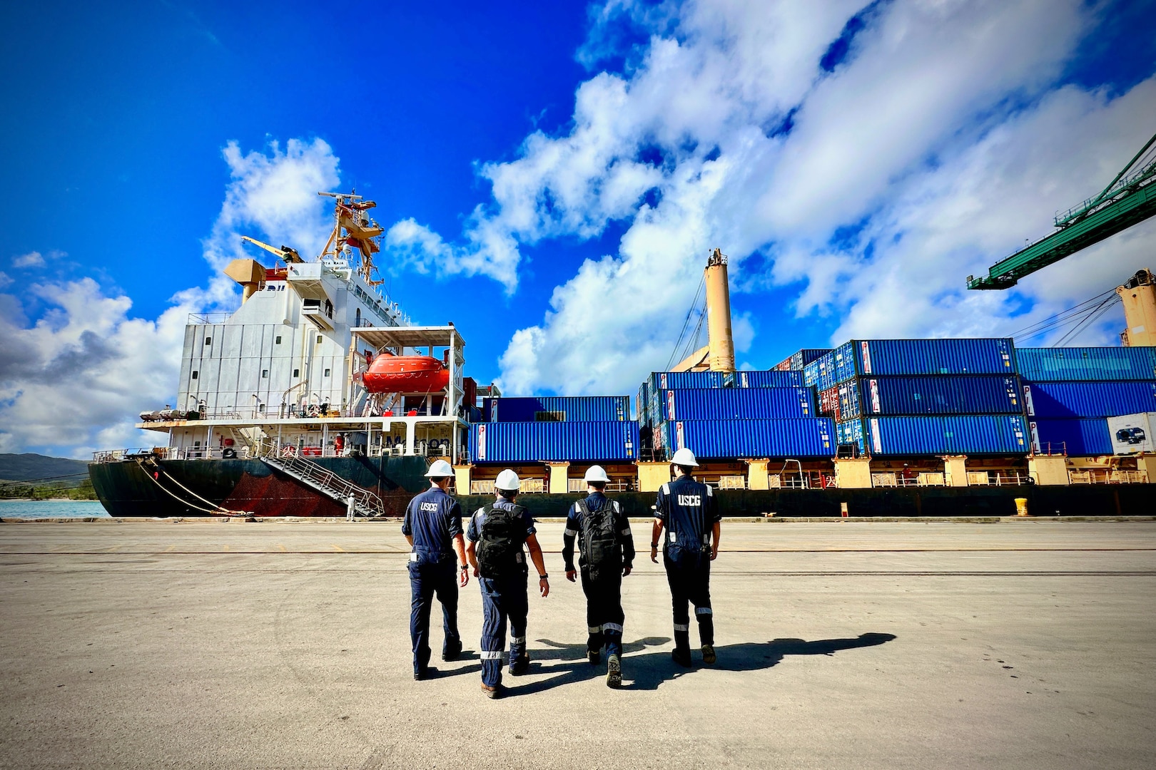 A U.S. Coast Guard Forces Micronesia Sector Guam team conducts a port state control examination on the 472-foot Singapore-flagged commercial cargo vessel Kota Raja in the Port of Guam on June 15, 2023.