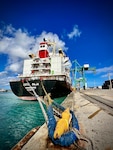 A U.S. Coast Guard Forces Micronesia Sector Guam team conducts a port state control examination on the 472-foot Singapore-flagged commercial cargo vessel Kota Raja in the Port of Guam on June 15, 2023.