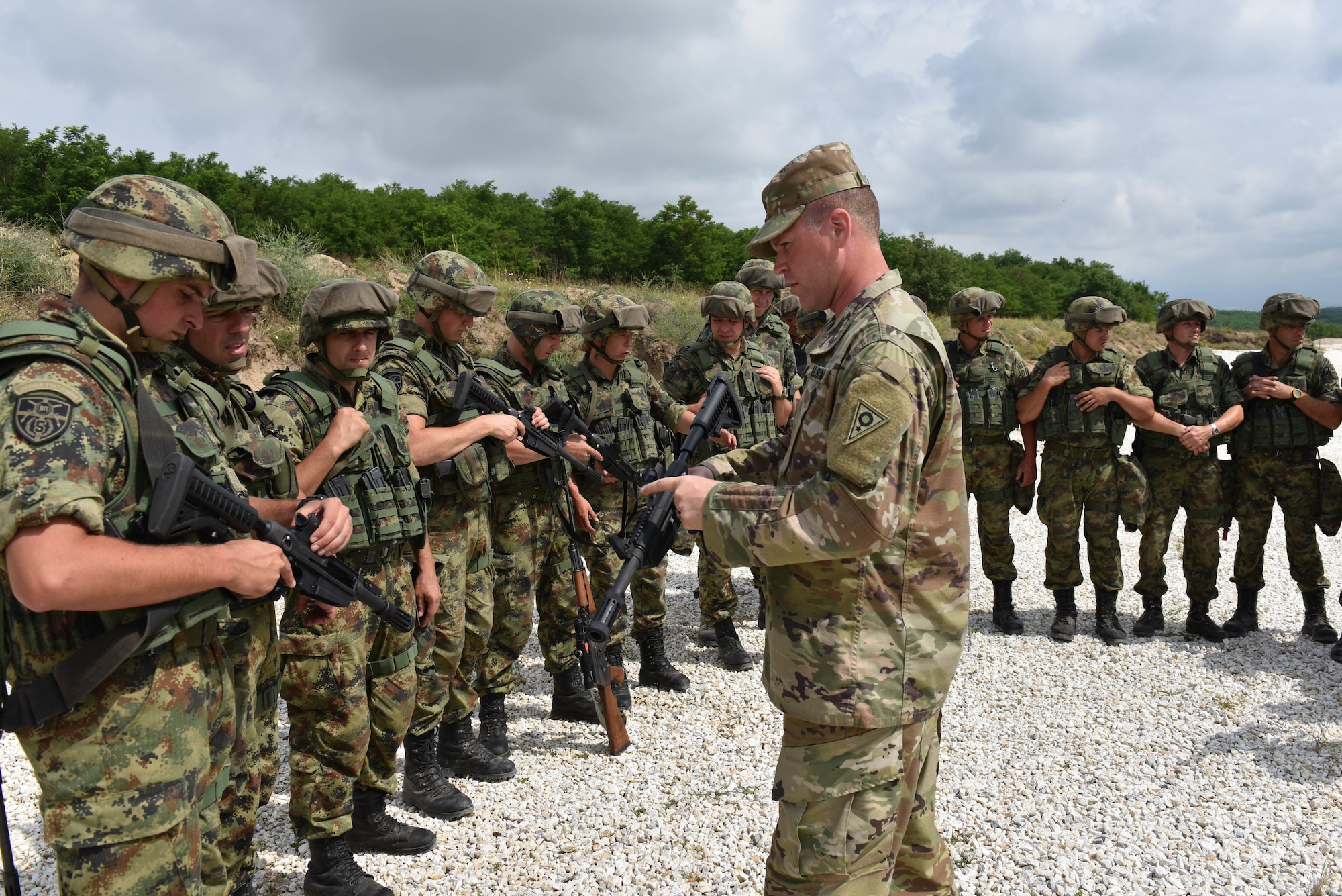 Sgt. Joshua Stiles, assigned to the Ohio National Guard’s Military Police Company, instructs members of the Serbian Armed Forces on non-lethal weapons tactics during Exercise Platinum Wolf 2018, June 15, 2018.