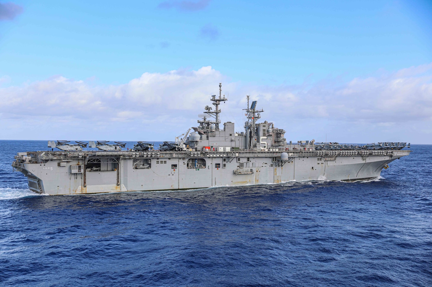 The Wasp-class amphibious assault ship USS Bataan (LHD 5) transits the Atlantic Ocean during the Carrier Strike Group Four Composite Training Unit Exercise (COMPTUEX).