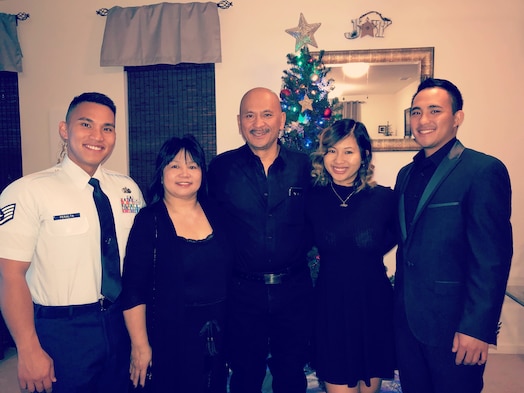  U.S. Space Force Tech Sgt. Luis Peralta poses for a family photo. (Courtesy photo)