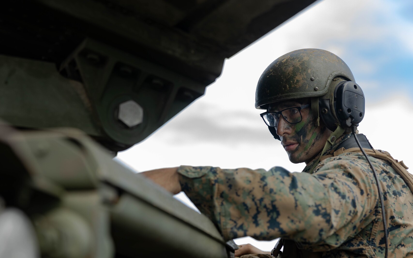 U.S. Marine Corps Cpl. Christian Hernandez conducts a maintenance inspection during a High Mobility Artillery Rocket System Rapid Infiltration demonstration on Iwo To, Japan, June 13, 2023. The exercise demonstrated the Marine Corps’ capability to rapidly emplace, fire, and displace in austere environments. Anderson, a native of Ivanhoe, California, is a High Mobility Artillery Rocket System operator with 5th Battalion, 11th Marines and is forward deployed in the Indo-Pacific under 3d Battalion, 12th Marines, 3d Marine Division as part of the Unit Deployment Program. (U.S. Marine Corps photo by Lance Cpl. Lucas Lu)