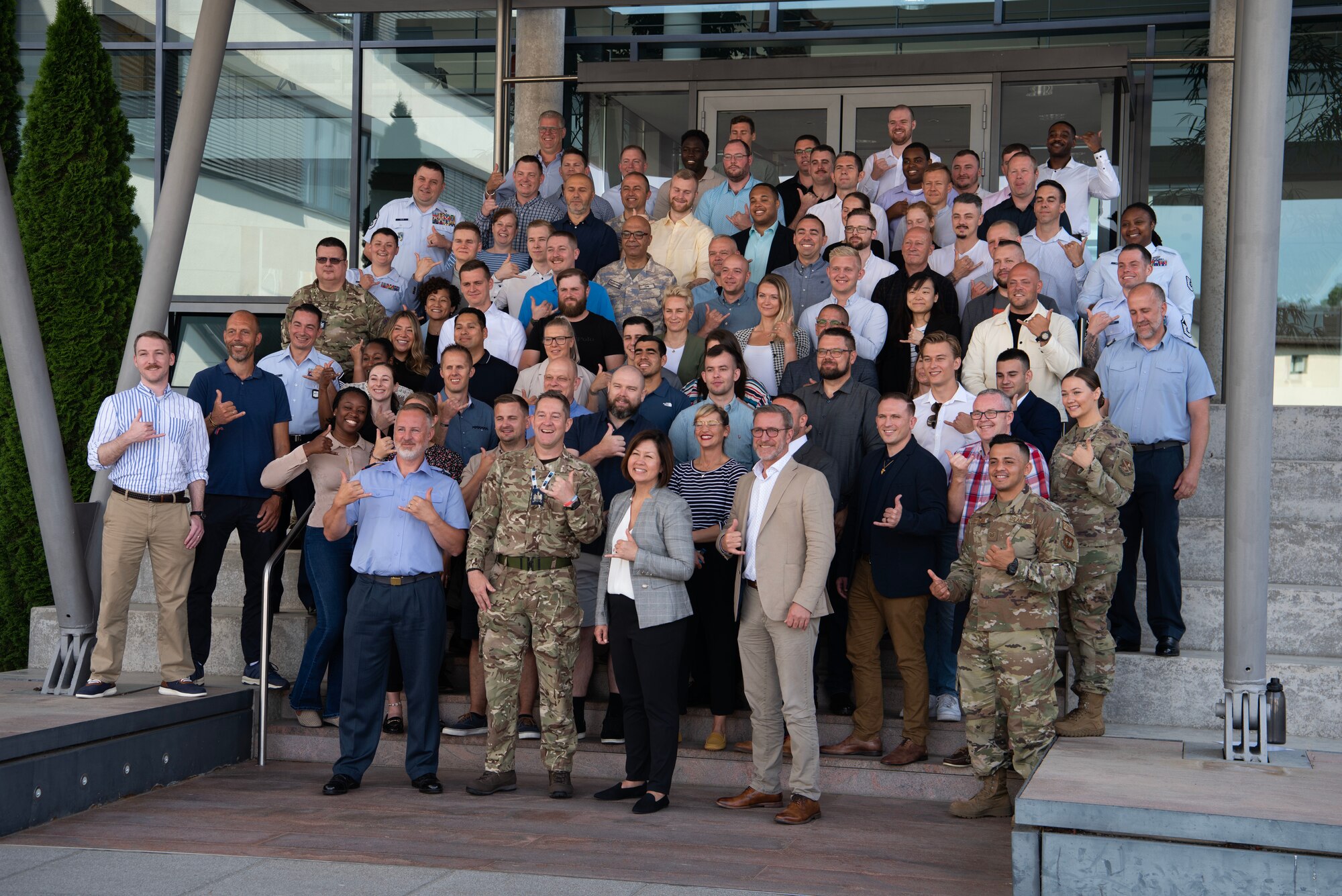 Members of the annual NATO Enlisted Summit gather for a group photo with Chief Master Sgt. of the Air Force JoAnne S. Bass, center bottom row, at Ramstein Air Base, Germany, June 20, 2023. The summit was developed to inspire strategic, innovative and creative thinking within the workplace to forge confidence and drive change from the bottom up. Its goal was to create an environment where service members are recognized and respected for their different interests, talents and skills. (U.S. Air Force photo by Airman 1st Class Tabatha Chapman)