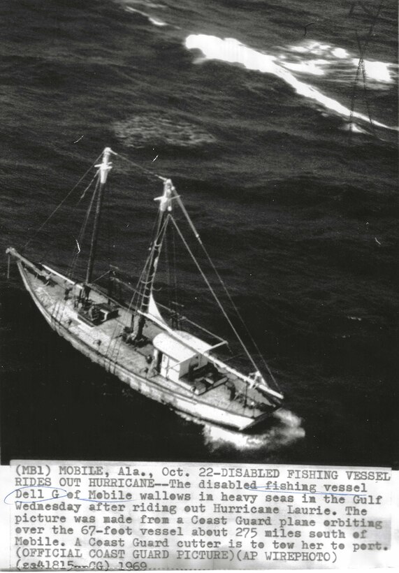 A picture of a disabled fishing vessel during Hurricane Laurie in 1969