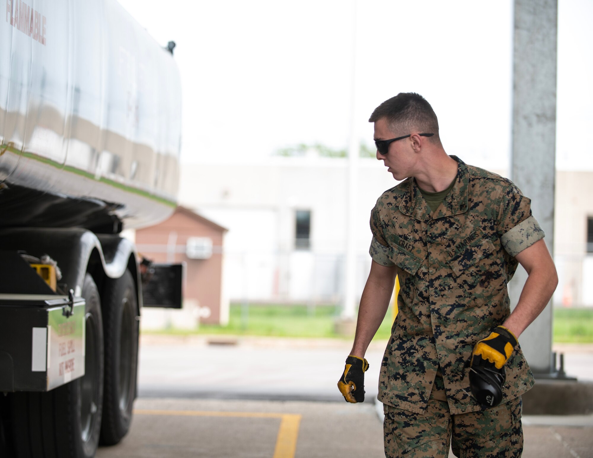 U.S. Marine Corps Lance Cpl. Matthew Craft, Marine Wing Support Squadron 471, conducts a vehicle inspection in St. Paul, Minn., May 17, 2023.