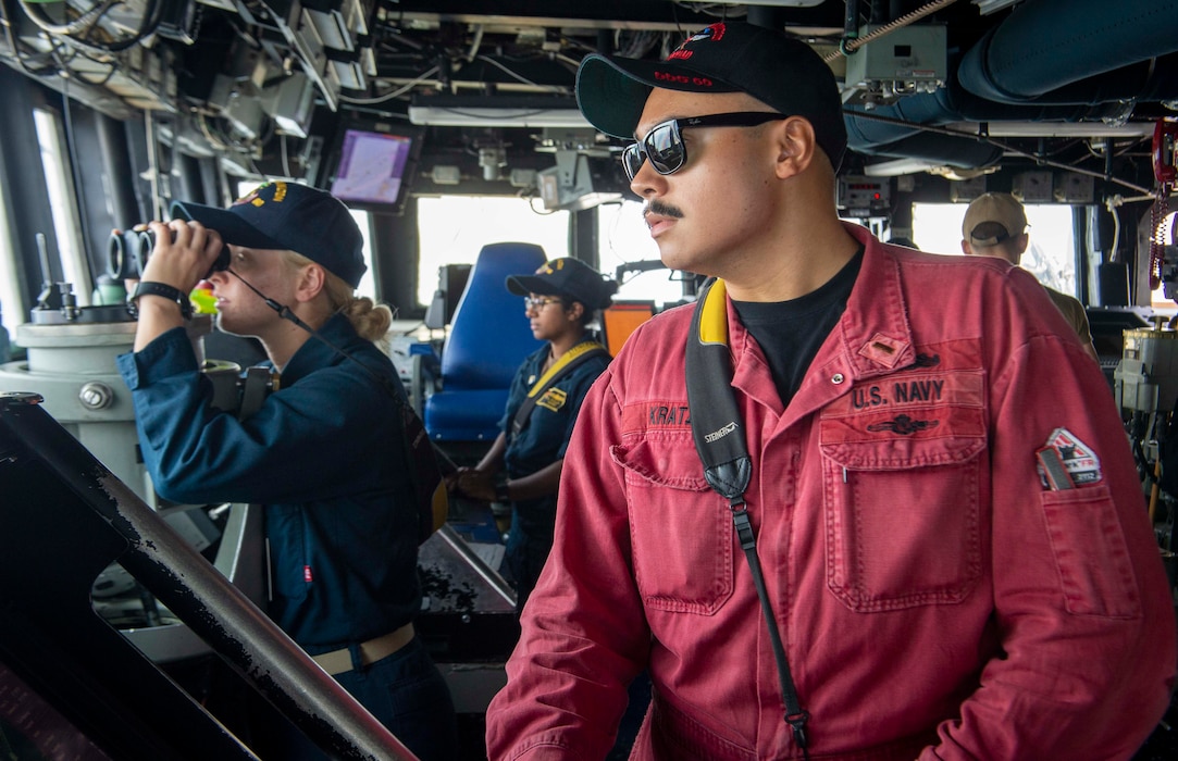 Sailors stand watch aboard USS Paul Hamilton (DDG 60) during a Strait of Hormuz transit.