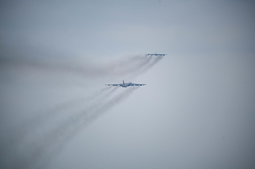 U.S. Air Force B-52H Stratofortresses assigned to the 23rd Bomb Squadron take off from the runway in support of a Bomber Task Force (BTF) mission at Minot Air Force Base, North Dakota, June 13, 2023. BTF missions provide integrated training opportunities with allies and validate readiness to respond to challenges around the globe. (U.S. Air Force photo by Airman 1st Class Kyle Wilson)