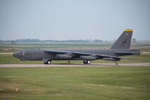 U.S. Air Force B-52H Stratofortresses assigned to the 23rd Bomb Squadron take off from the runway in support of a Bomber Task Force (BTF) mission at Minot Air Force Base, North Dakota, June 13, 2023. BTF missions provide integrated training opportunities with allies and validate readiness to respond to challenges around the globe. (U.S. Air Force photo by Airman 1st Class Kyle Wilson)