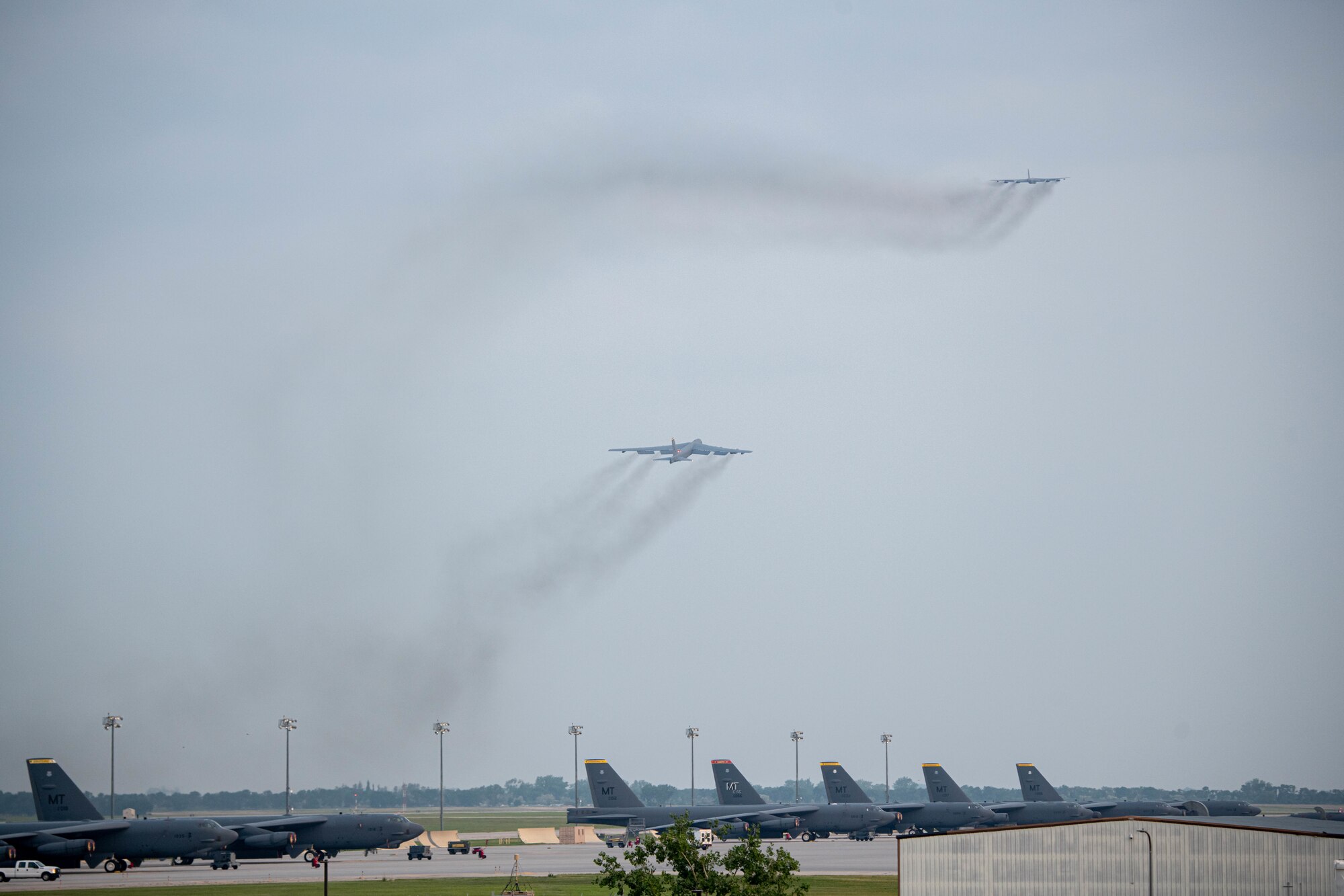 U.S. Air Force B-52H Stratofortresses assigned to the 23rd Bomb Squadron take off from the runway in support of a Bomber Task Force (BTF) mission at Minot Air Force Base, North Dakota, June 13, 2023. BTF missions provide integrated training opportunities with allies and validate readiness to respond to challenges around the globe. (U.S. Air Force photo by Airman 1st Class Kyle Wilson)