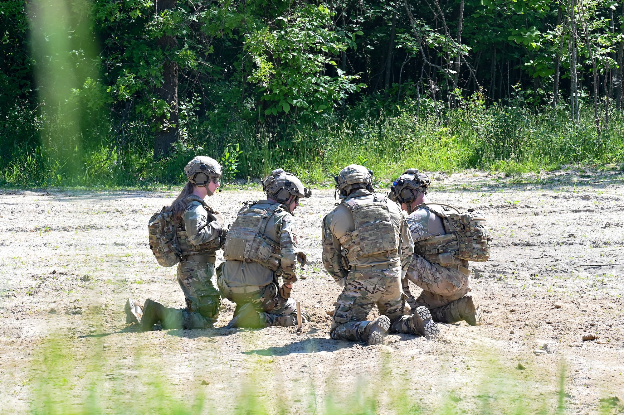 Integrated Defense Leadership Course cadre prepare a claymore for detonation on June 1, 2023, at Camp James A. Garfield Joint Military Training Center, Ohio.