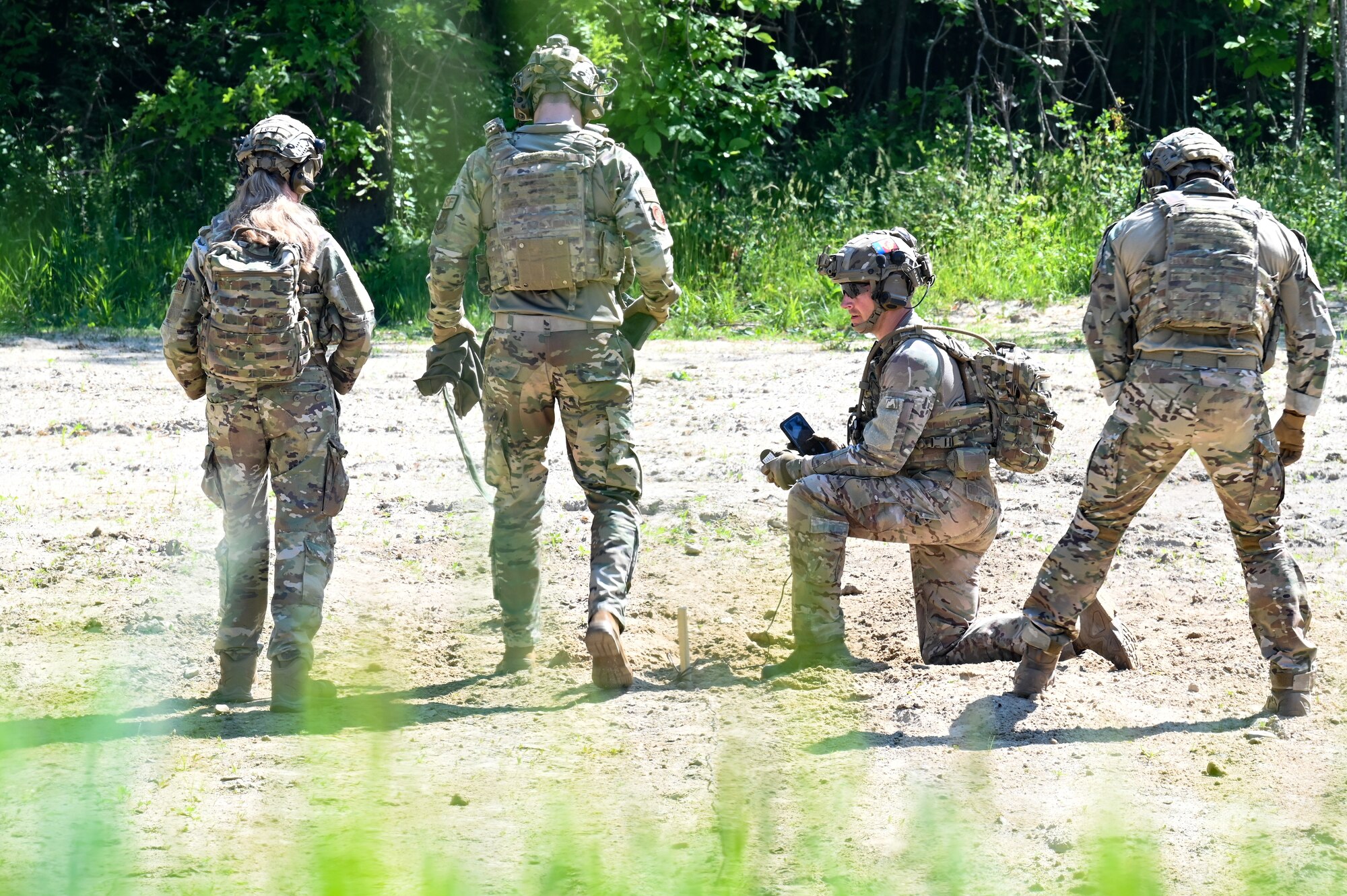 Integrated Defense Leadership Course cadre prepare a claymore for detonation on June 1, 2023, at Camp James A. Garfield Joint Military Training Center, Ohio.