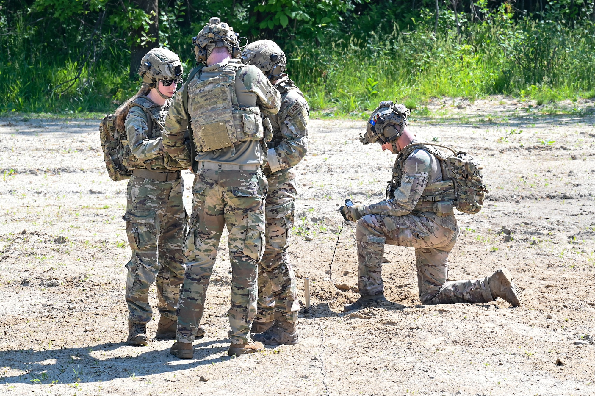 Integrated Defense Leadership Course cadre prepare a claymore for detonation on June 1, 2023, at Camp James A. Garfield Joint Military Training Center, Ohio.