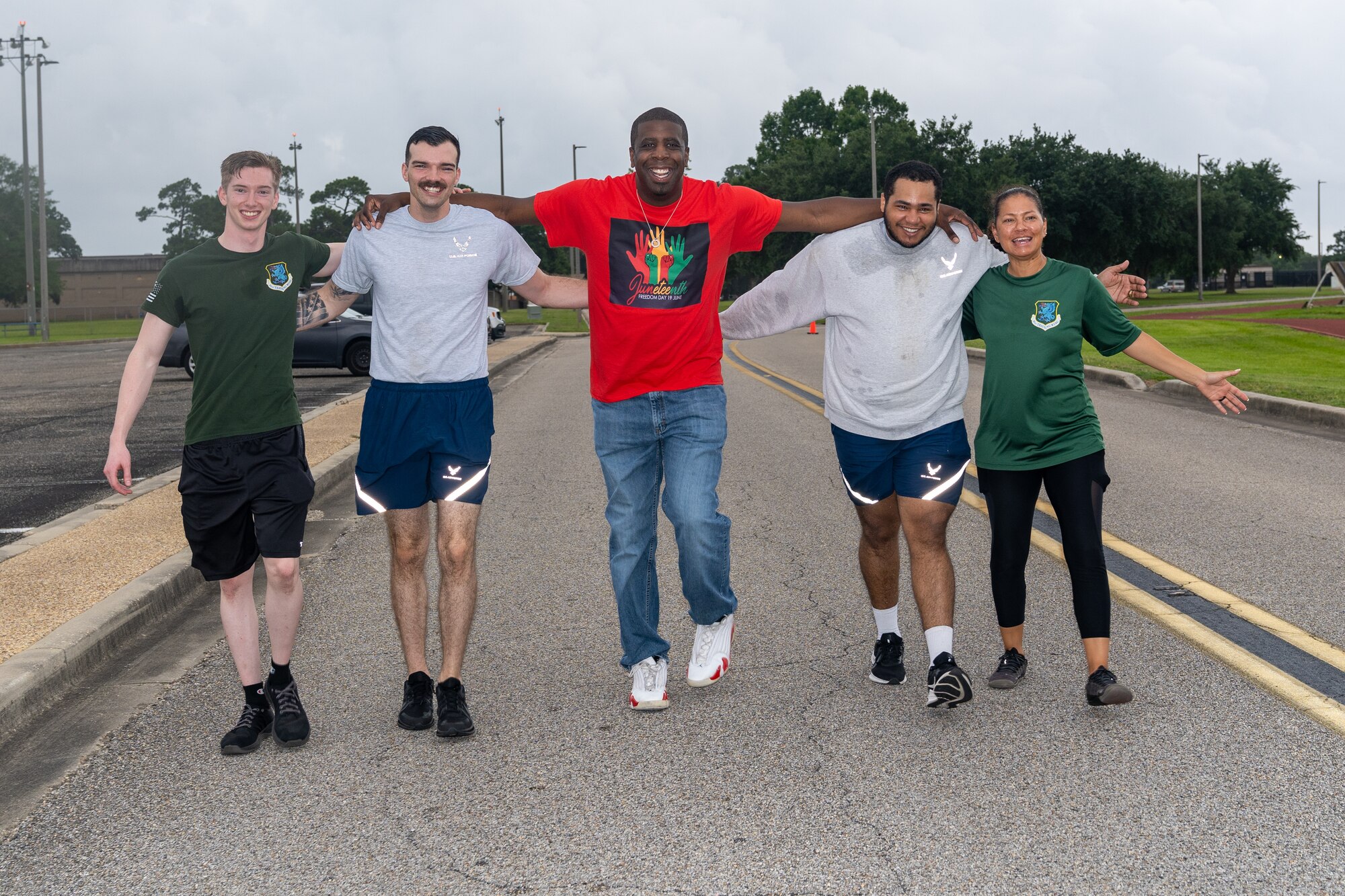 81st Training Wing Airmen and civilians take part in a one mile jamboree walk to celebrate Juneteenth at Keesler Air Force Base, Mississippi, June 16, 2023.