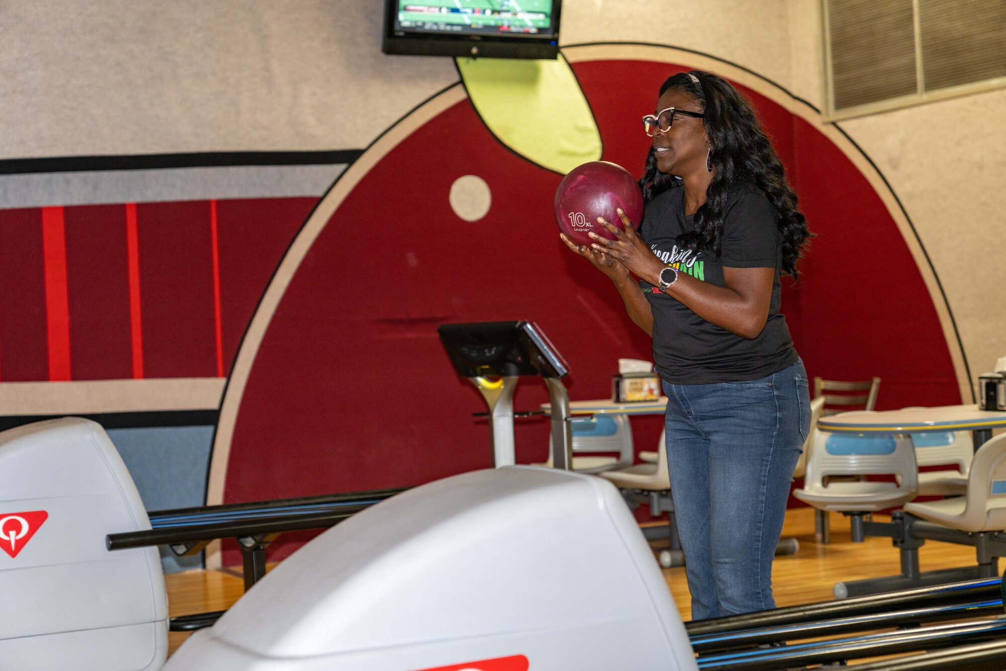 Lavette Ashley-Williams, 336th Training Squadron instructor, bowls her lane during the Juneteenth celebration at Keesler Air Force Base, Mississippi, June 16, 2023.