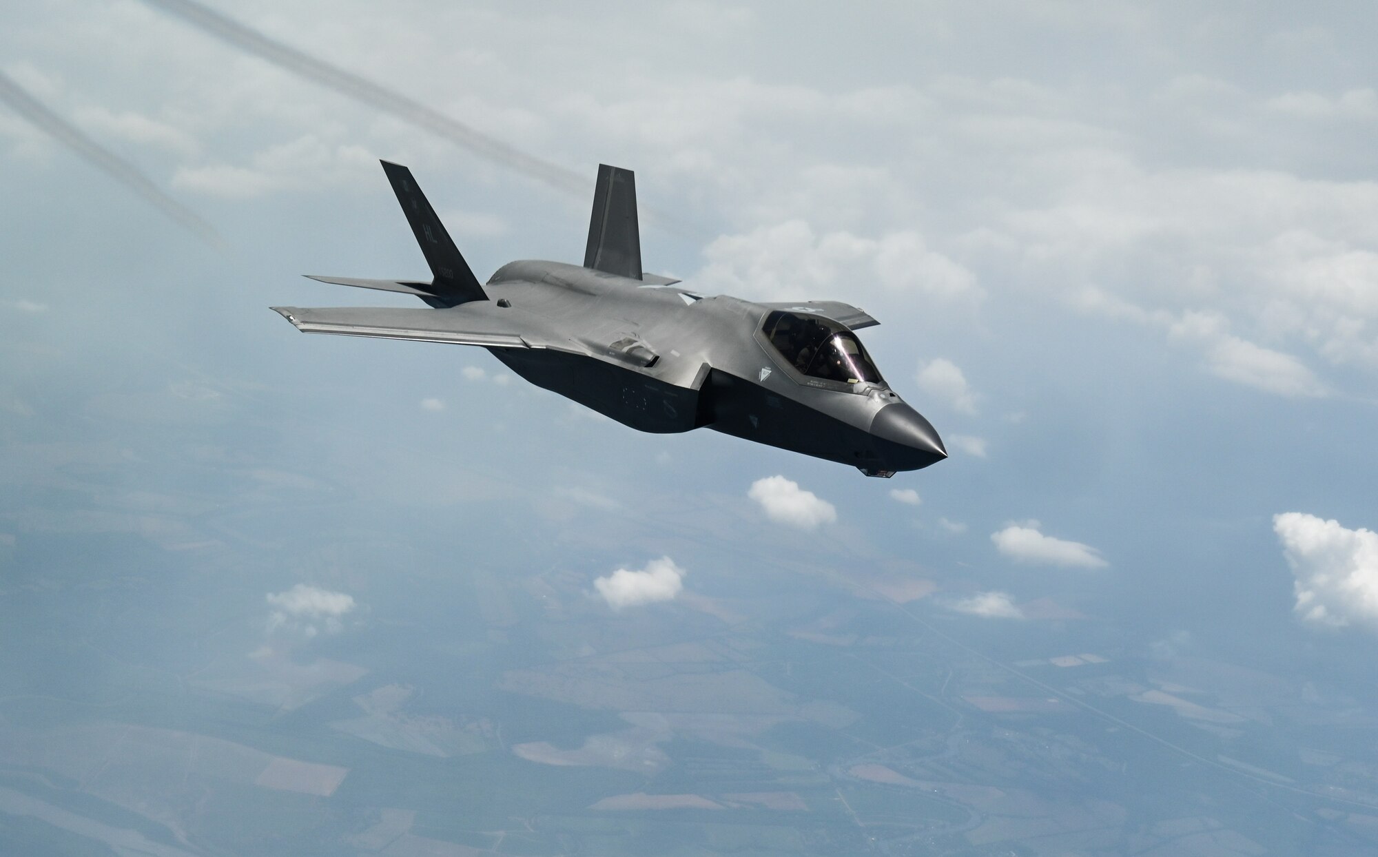 The F-35 Lightning II Demonstration Team assigned to 388th Fighter Wing at Hill Air Force Base, Utah, heads back to home station after receiving aerial refueling from a KC-135 Stratotanker assigned to the 465th Air Refueling Squadron at Tinker Air Force Base, Oklahoma, May 31, 2023.  Aerial refueling allows aircraft across the DoD inventory to travel greater distances without having to land to refuel.