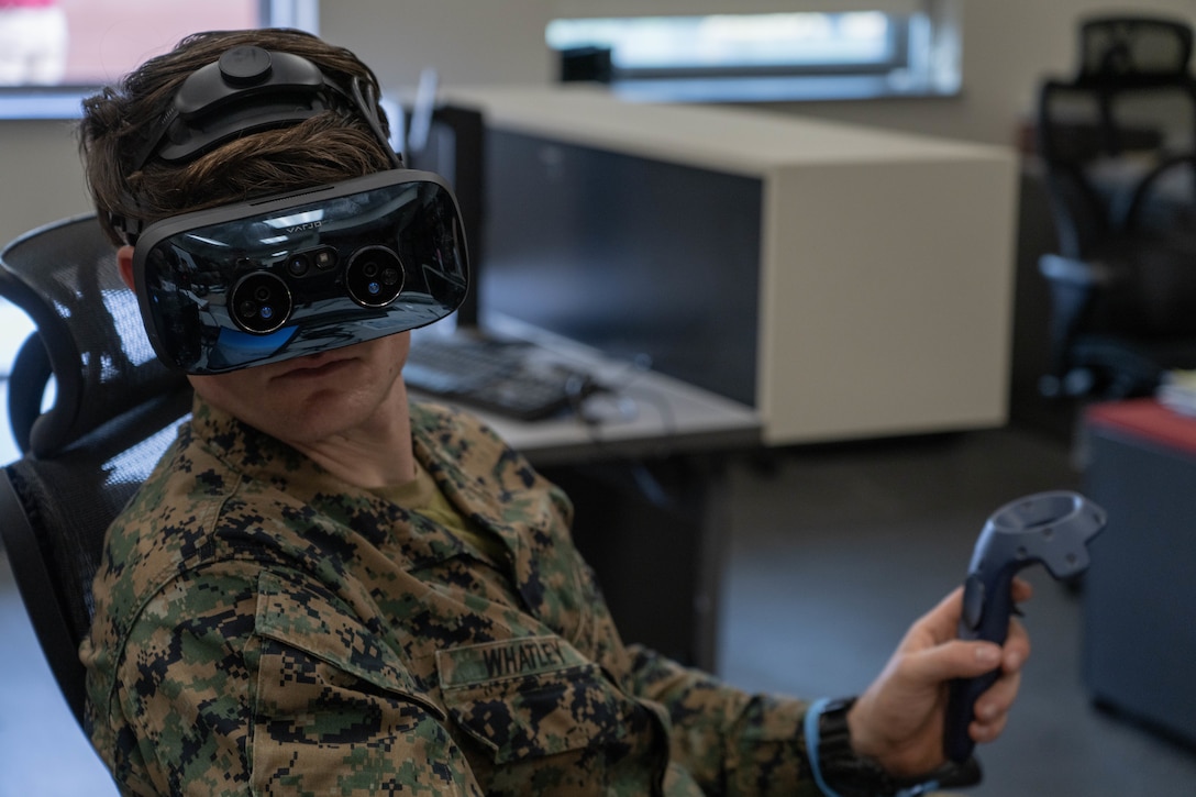 U.S. Marine Corps Sgt. Mason Whatley, a radio operator with 1st Air Naval Gunfire Liaison Company, I Marine Expeditionary Force Information Group, uses a Varjo XR-3 mixed reality headset during 1st ANGLICO certification exercise 2-23 at Marine Corps Base Camp Pendleton, California, Jan. 11, 2023. The first week of CERTEX 2-23 covers immersive simulation training in order to certify firepower control teams for future integration with other units. (U.S. Marine Corps photo by Lance Cpl. Joseph Helms)