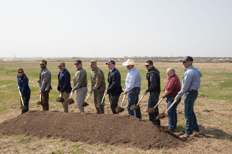 Leaders from USACE Omaha District and Barnard Construction, along with Mayor of Jamestown, Dwaine Heinrich and U.S. Senator, John Hoevan, South Dakota participate in the golden shovel presentation at the Pipestem spillway modification project ground breaking ceremony in Jamestown, North Dakota on May 25, 2023.