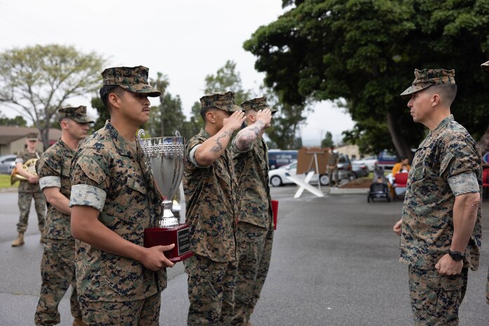 U.S. Marines with 1st Light Armored Reconnaissance Battalion, 1st Marine Division, salute Maj. Gen. Benjamin T. Watson, the commanding general for 1st MARDIV, after being awarded for winning the 2023 Bushmaster Challenge during the division’s morning colors ceremony at Marine Corps Base Camp Pendleton, California, June 2, 2023. The division holds the ceremony every quarter to recognize Marines and Sailors for outstanding performance.