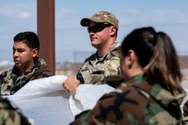 U.S. Air Force Airman 1st Class Kaelon Duke, a 99th Civil Engineer Squadron Emergency Manager, trains Airmen from various career fields to respond to different chemical, biological, radiological and nuclear emergencies at Nellis Air Force Base, Nevada, June 14, 2023.