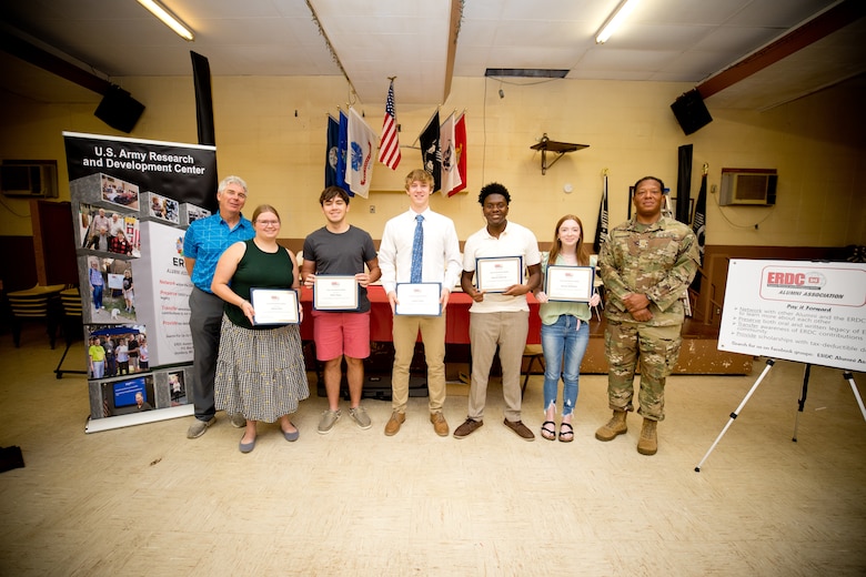 Recipients of the U.S. Army Engineer Research and Development Center (ERDC) Alumni Association’s 2023 scholarships were presented certificates from ERDC Alumni Association President Ernie Smith and ERDC Deputy Commander for Support Maj. Joseph Henderson during a ceremony at the Vicksburg VFW in Vicksburg, Miss., June 16, 2023. Selectees present were (from left to right) Rachel Dahl, Noah Taylor, Lawson Selby, Kameron Peterson and Henlee Middleton. Other winners not pictured were Victoria Carrica, Clover McGowan and Elizabeth Mitchell. (U.S. Army Corps of Engineers photo by Jared Eastman)