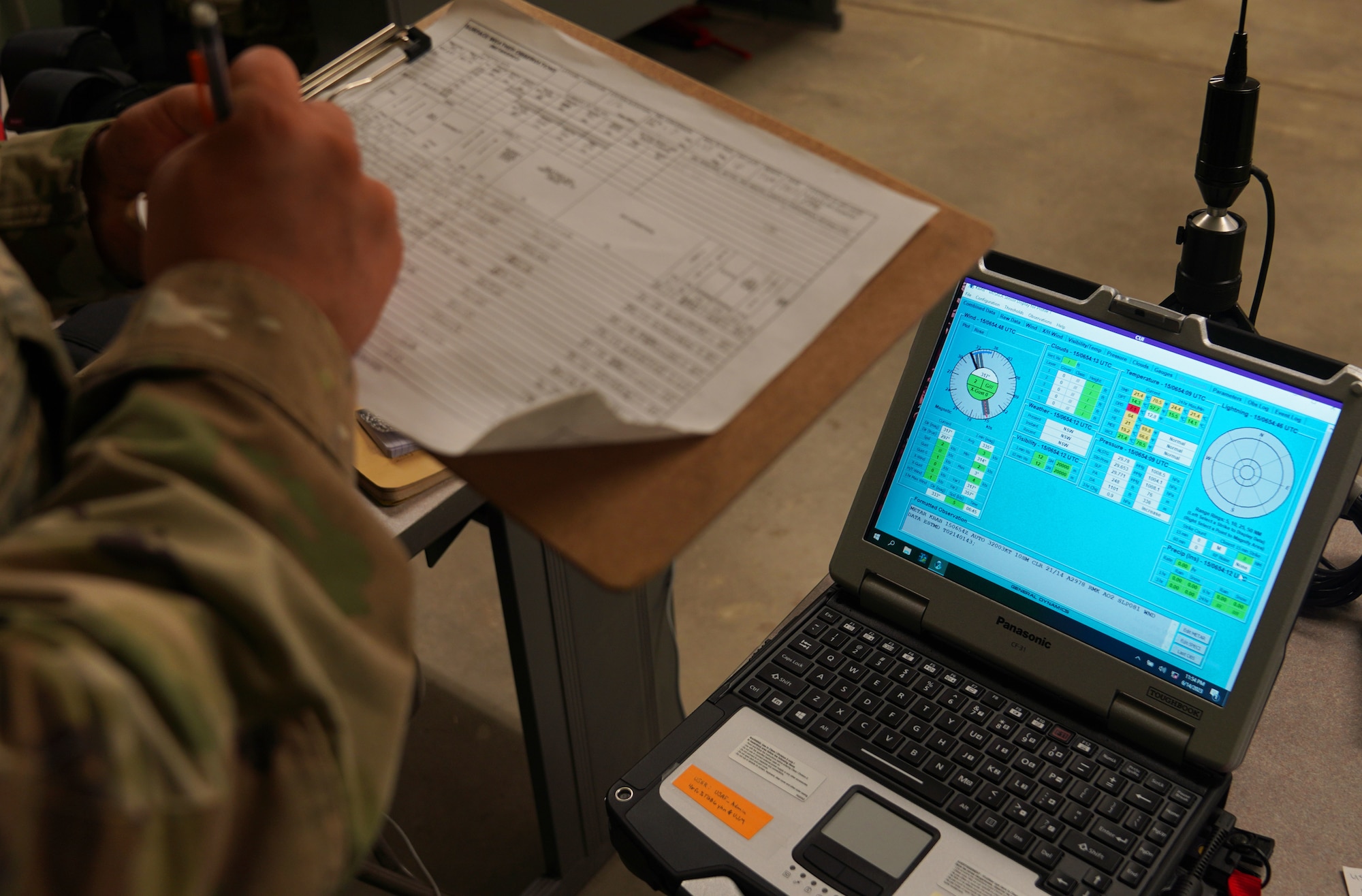 U.S. Air Force Airman 1st Class Anthony Quintana, 9th Operations Support Squadron weather technician, notes weather conditions during exercise DRAGON FANG, June 14, 2023, at Beale Air Force Base, California.