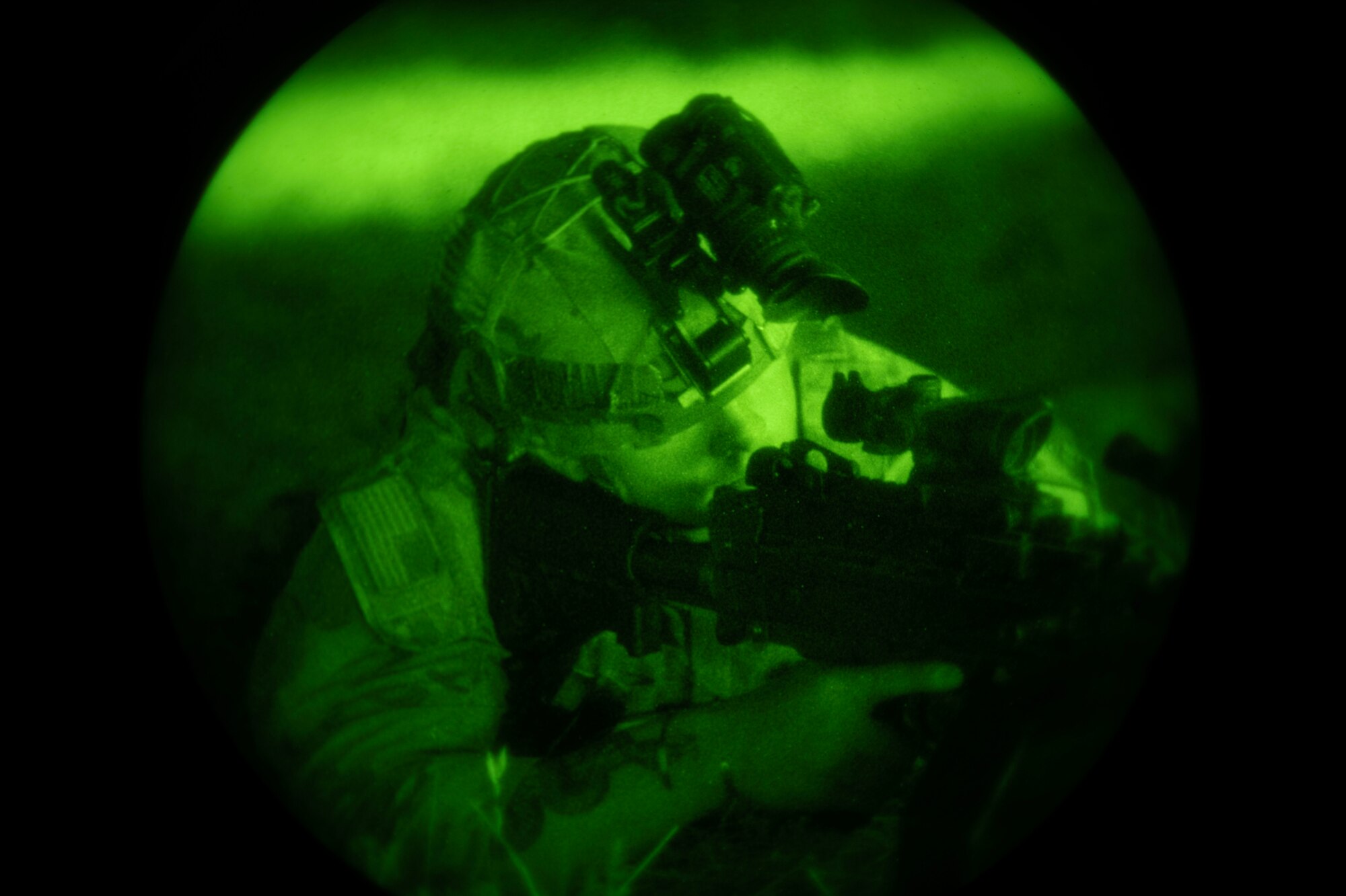 U.S. Air Force Staff Sgt. Brennan Wright, 9th Security Forces Squadron patrolman, looks through the scope of an M249, June 16, 2023, at Beale Air Force Base, California.