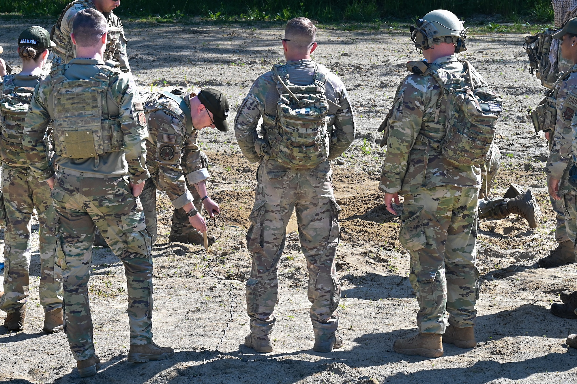 Senior Master Sgt. Jason Knepper, Air Force Reserve Command Security Forces training manager, gives instructions on how to detonate a claymore to the Integrated Defense Leadership Course cadre on June 1, 2023, at Camp James A. Garfield Joint Military Training Center, Ohio.