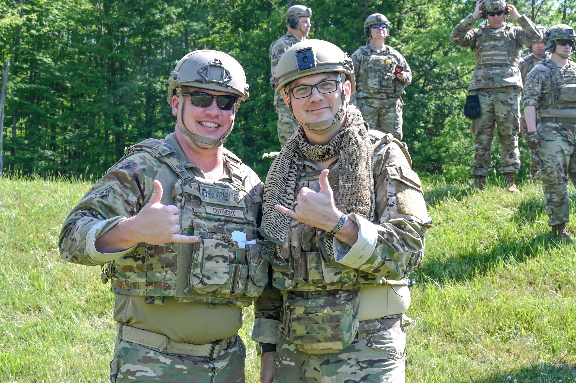 Master Sgt. Adam Cutright, the Integrated Defense Leadership Course assistant course chief assigned to the 919th Security Forces Squadron, Hurlburt Field, Florida, and Senior Master Sgt. Jason Knepper, Air Force Reserve Command Security Forces training manager, pose for a picture on June 1, 2023, at Camp James A. Garfield Joint Military Training Center, Ohio.