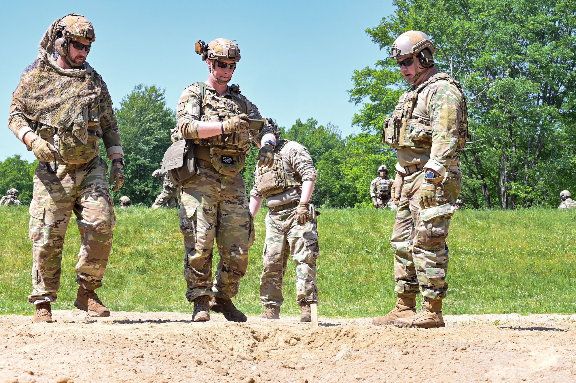 Integrated Defense Leadership Course cadre prepare a claymore for detonation on June 1, 2023, at Camp James A. Garfield Joint Military Training Center, Ohio.