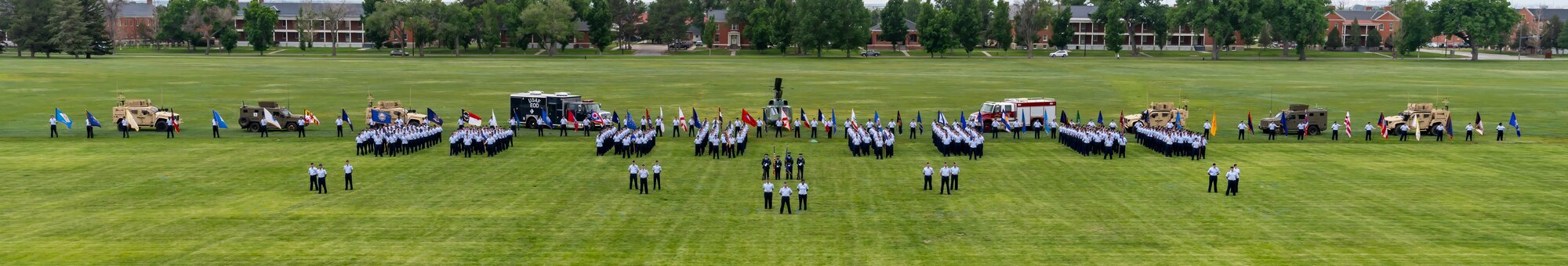 90 MW Airmen pose for a group photo during change of command.