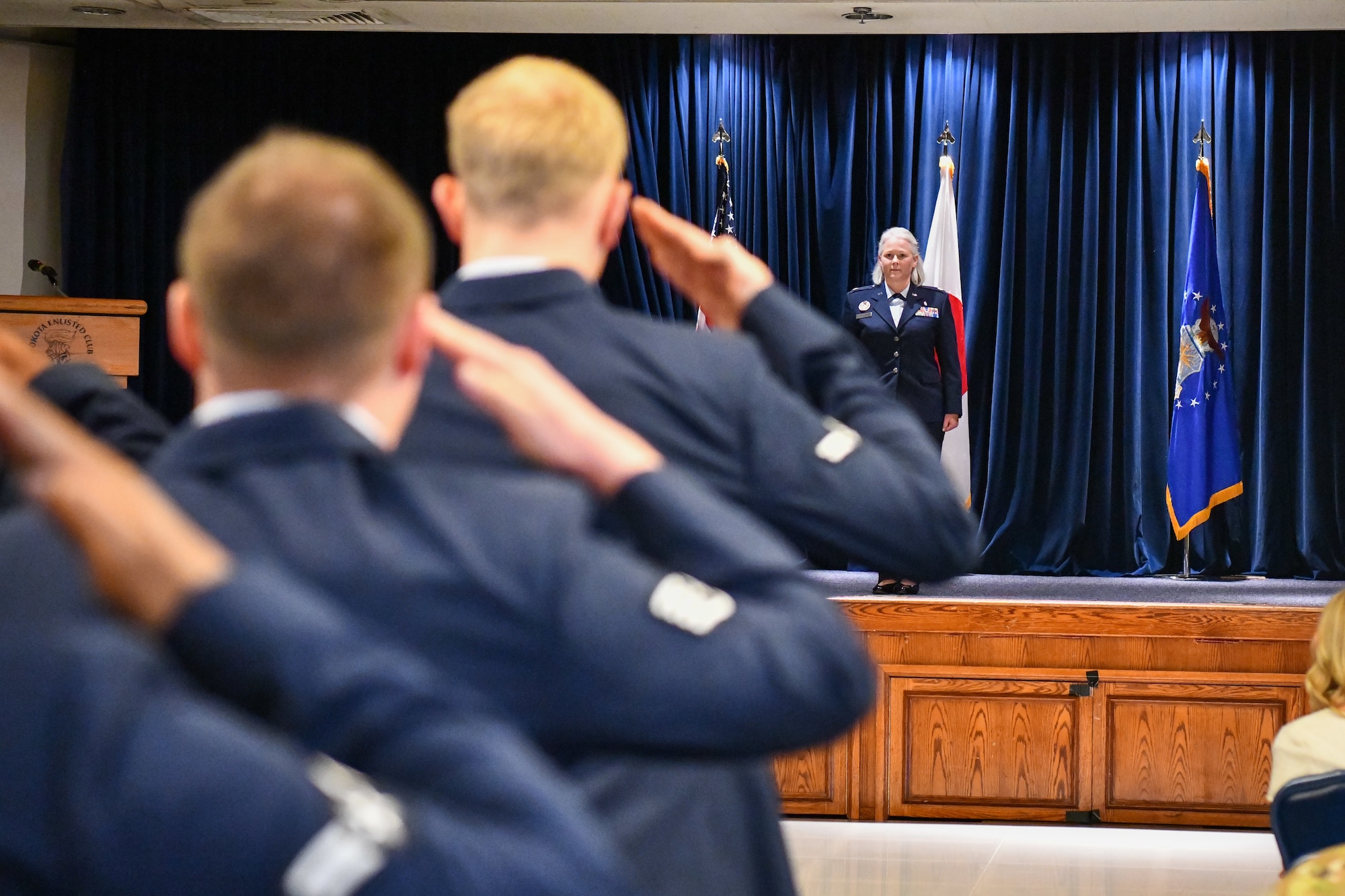Lt. Col. Jaime F. Kelbaugh, 374th Surgical Operations Squadron commander, receives her first salute from members of the 374th SGCS during an assumption of command ceremony